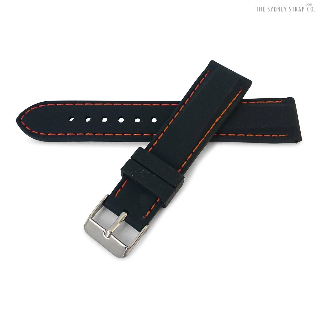 Black watch strap with orange stitching on a white background, branded 'The Sydney Strap Co'.